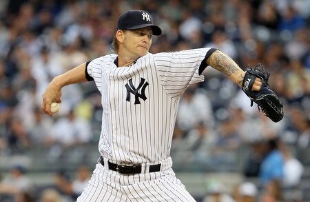 NEW YORK, NY - JUNE 13:  A.J. Burnett #34 of the New York Yankees delivers a pitch against the Cleveland Indians on June 13, 2011 at Yankee Stadium in the Bronx borough of New York City.  <br /><br /><span class="help">(Photo by Jim McIsaac/Getty Images)</span>