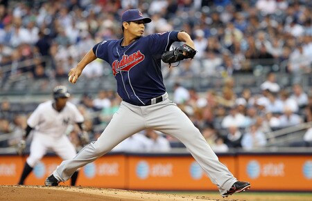 NEW YORK, NY - JUNE 13:  Carlos Carrasco #59 of the Cleveland Indians delivers a pitch against the New York Yankees on June 13, 2011 at Yankee Stadium in the Bronx borough of New York City.  <br /><br /><span class="help">(Photo by Jim McIsaac/Getty Images)</span>