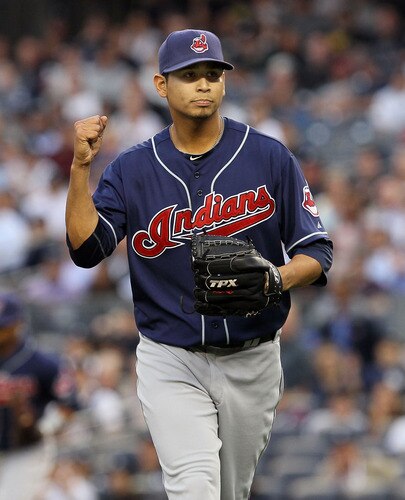 NEW YORK, NY - JUNE 13:  Carlos Carrasco #59 of the Cleveland Indians reacts after getting out of a first inning bases loaded no out jam against the New York Yankees on June 13, 2011 at Yankee Stadium in the Bronx borough of New York City.  <br /><br /><span class="help">(Photo by Jim McIsaac/Getty Images)</span>