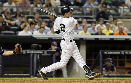 NEW YORK, NY - JUNE 13:  Derek Jeter #2 of the New York Yankees flies out in the fifth inning against the Cleveland Indians on June 13, 2011 at Yankee Stadium in the Bronx borough of New York City. Jeter suffered a sore right calf on the play and left the game.  <br /><br /><span class="help">(Photo by Jim McIsaac/Getty Images)</span>