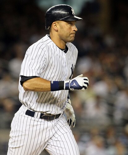 NEW YORK, NY - JUNE 13:  Derek Jeter #2 of the New York Yankees runs as he flies out in the fifth inning against the Cleveland Indians on June 13, 2011 at Yankee Stadium in the Bronx borough of New York City. Jeter suffered a sore right calf on the play and left the game.  <br /><br /><span class="help">(Photo by Jim McIsaac/Getty Images)</span>