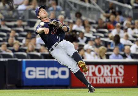 NEW YORK, NY - JUNE 13:  Jack Hannahan #9 of the Cleveland Indians throws to first for the final out of the seventh inning against the New York Yankees on June 13, 2011 at Yankee Stadium in the Bronx borough of New York City. Cleveland defeated the Yankees 1-0.  <br /><br /><span class="help">(Photo by Jim McIsaac/Getty Images)</span>