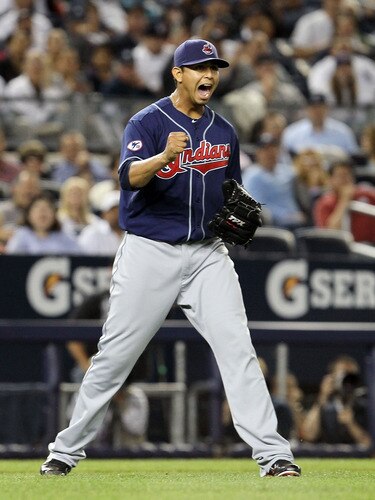 NEW YORK, NY - JUNE 13:  Carlos Carrasco #59 of the Cleveland Indians reacts after the final out of the seventh inning against the New York Yankees on June 13, 2011 at Yankee Stadium in the Bronx borough of New York City.  <br /><br /><span class="help">(Photo by Jim McIsaac/Getty Images)</span>