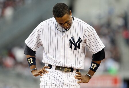NEW YORK, NY - JUNE 13:  Curtis Granderson #14 of the New York Yankees looks on after flying out to end the second inning against the Cleveland Indians on June 13, 2011 at Yankee Stadium in the Bronx borough of New York City.  <br /><br /><span class="help">(Photo by Jim McIsaac/Getty Images)</span>