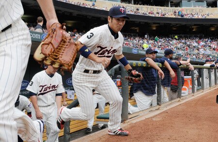 MINNEAPOLIS, MN - JUNE 16: Tsuyoshi Nishioka #1 of the Minnesota Twins takes the field against the Chicago White Sox before the game on June 16, 2011 at Target Field in Minneapolis, Minnesota. This is the first game Tsuyoshi Nishioka is playing at home after he broke his leg on April 7, 2011 against the New York Yankees.  <br /><br /><span class="help">(Photo by Hannah Foslien/Getty Images)</span>