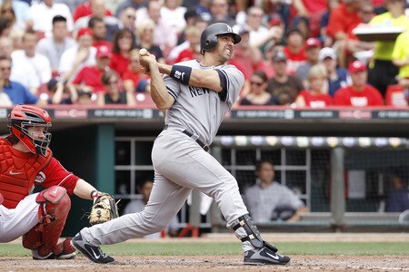 CINCINNATI, OH - JUNE 22: Jorge Posada #20 of the New York Yankees breaks a tie game with a two-run home run in the sixth inning against the Cincinnati Reds at Great American Ball Park on June 22, 2011 in Cincinnati, Ohio. The Yankees defeated the Reds 4-2. <br /><br /><span class="help">(Photo by Joe Robbins/Getty Images)</span>