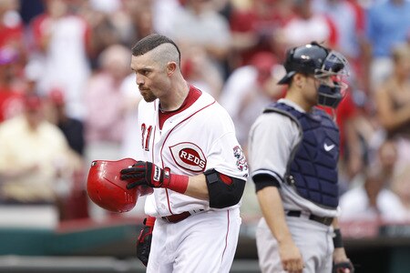 CINCINNATI, OH - JUNE 22: Jonny Gomes #31 of the Cincinnati Reds heads to the dugout after hitting a home run in the second inning against the New York Yankees at Great American Ball Park on June 22, 2011 in Cincinnati, Ohio. <br /><br /><span class="help">(Photo by Joe Robbins/Getty Images)</span>