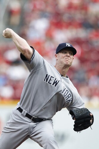 CINCINNATI, OH - JUNE 22: Brian Gordon #22 of the New York Yankees pitches against the Cincinnati Reds during the second game of a doubleheader at Great American Ball Park on June 22, 2011 in Cincinnati, Ohio. <br /><br /><span class="help">(Photo by Joe Robbins/Getty Images)</span>