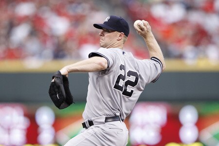 CINCINNATI, OH - JUNE 22: Brian Gordon #22 of the New York Yankees pitches against the Cincinnati Reds during the second game of a doubleheader at Great American Ball Park on June 22, 2011 in Cincinnati, Ohio. <br /><br /><span class="help">(Photo by Joe Robbins/Getty Images)</span>