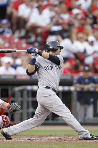 CINCINNATI, OH - JUNE 22: Nick Swisher #33 of the New York Yankees hits a home run in the second inning during the second game of a doubleheader against the Cincinnati Reds at Great American Ball Park on June 22, 2011 in Cincinnati, Ohio. <br /><br /><span class="help">(Photo by Joe Robbins/Getty Images)</span>