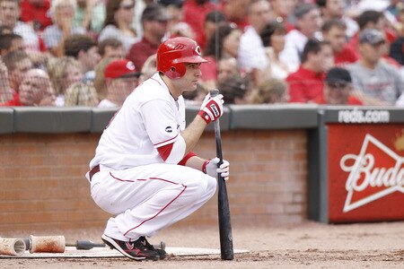CINCINNATI, OH - JUNE 22: Joey Votto #19 of the Cincinnati Reds looks on while waiting to bat during the second game of a doubleheader against the New York Yankees at Great American Ball Park on June 22, 2011 in Cincinnati, Ohio. <br /><br /><span class="help">(Photo by Joe Robbins/Getty Images)</span>