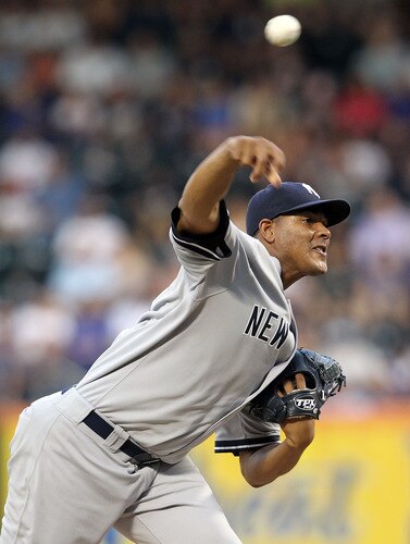 NEW YORK, NY - JULY 01:  Ivan Nova #47 of the New York Yankees pitches against the New York Mets at Citi Field on July 1, 2011 in the Flushing neighborhood of the Queens borough of New York City.  <br /><br /><span class="help">(Photo by Nick Laham/Getty Images)</span>