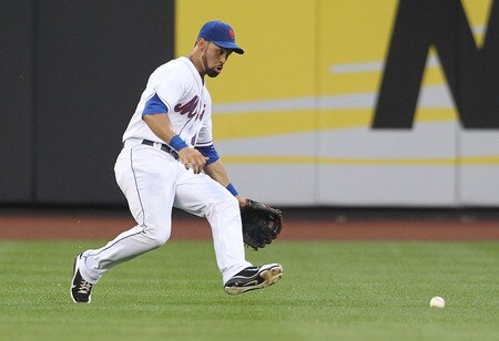 NEW YORK, NY - JULY 01: Angel Pagan #16 of the New York Mets fails to catch a fly ball in the third inning against the New York Yankees at Citi Field on July 1, 2011 in the Flushing neighborhood of the Queens borough of New York City.  <br /><br /><span class="help">(Photo by Nick Laham/Getty Images)</span>