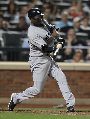 NEW YORK, NY - JULY 01: Eduardo Nunez #26  of the New York Yankees hits a single against the New York Mets at Citi Field on July 1, 2011 in the Flushing neighborhood of the Queens borough of New York City.  <br /><br /><span class="help">(Photo by Nick Laham/Getty Images)</span>