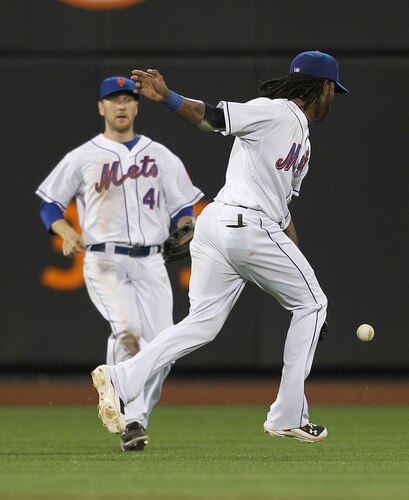 NEW YORK, NY - JULY 01: Jose Reyes #7 of the New York Mets fails to catch a Eduardo Nunez #26 of the New York Yankees fly ball during their game at Citi Field on July 1, 2011 in the Flushing neighborhood of the Queens borough of New York City.  <br /><br /><span class="help">(Photo by Nick Laham/Getty Images)</span>