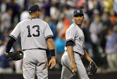 NEW YORK, NY - JULY 01: Alex Rodriguez #13 of the New York Yankees talks to Mariano Rivera #42 after the win against the New York Mets at Citi Field on July 1, 2011 in the Flushing neighborhood of the Queens borough of New York City.  <br /><br /><span class="help">(Photo by Nick Laham/Getty Images)</span>