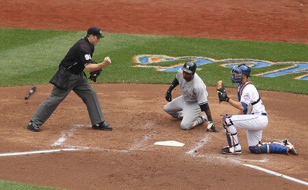 NEW YORK, NY - JULY 02:  Josh Thole #30 of the New York Mets tags out Eduardo Nunez #26 of the New York Yankees during their game on July 2, 2011 at Citi Field in the Flushing neighborhood of the Queens borough of New York City.  The home plate umpire is Brian Knight #91.  <br /><br /><span class="help">(Photo by Al Bello/Getty Images)</span>