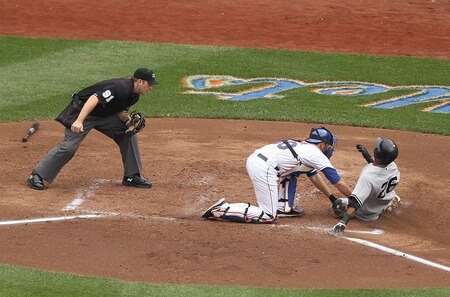 NEW YORK, NY - JULY 02:  Josh Thole #30 of the New York Mets tags out Eduardo Nunez #26 of the New York Yankees during their game on July 2, 2011 at Citi Field in the Flushing neighborhood of the Queens borough of New York City.  The home plate umpire is Brian Knight #91.  <br /><br /><span class="help">(Photo by Al Bello/Getty Images)</span>