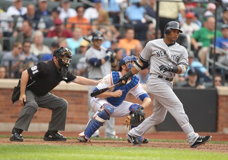 NEW YORK, NY - JULY 02:  Robinson Cano #24 of the New York Yankees hits a triple and drives in two runs in the sixth inning against the New York Mets during their game on July 2, 2011 at Citi Field in the Flushing neighborhood of the Queens borough of New York City.  <br /><br /><span class="help">(Photo by Al Bello/Getty Images)</span>