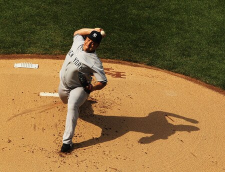 NEW YORK, NY - JULY 02:  Bartolo Colon #40 of the New York Yankees pitches against the New York Mets during their game on July 2, 2011 at Citi Field in the Flushing neighborhood of the Queens borough of New York City.  <br /><br /><span class="help">(Photo by Al Bello/Getty Images)</span>