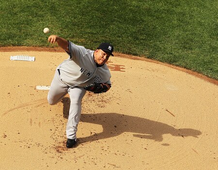 NEW YORK, NY - JULY 02:  Bartolo Colon #40 of the New York Yankees pitches against the New York Mets during their game on July 2, 2011 at Citi Field in the Flushing neighborhood of the Queens borough of New York City.  <br /><br /><span class="help">(Photo by Al Bello/Getty Images)</span>