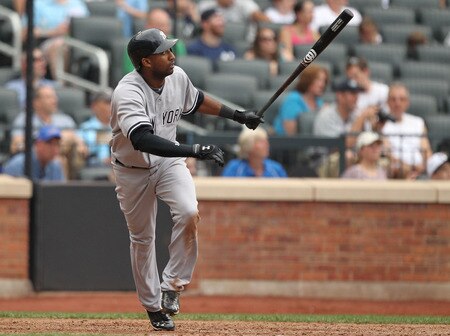 NEW YORK, NY - JULY 02:  Eduardo Nunez #26 of the New York Yankees hits a home run against the New York Mets during their game on July 2, 2011 at Citi Field in the Flushing neighborhood of the Queens borough of New York City.  <br /><br /><span class="help">(Photo by Al Bello/Getty Images)</span>