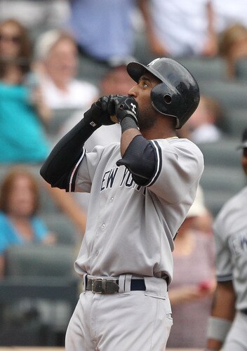 NEW YORK, NY - JULY 02:  Eduardo Nunez #26 of the New York Yankees reacts after hitting a home run against the New York Mets during their game on July 2, 2011 at Citi Field in the Flushing neighborhood of the Queens borough of New York City.  <br /><br /><span class="help">(Photo by Al Bello/Getty Images)</span>