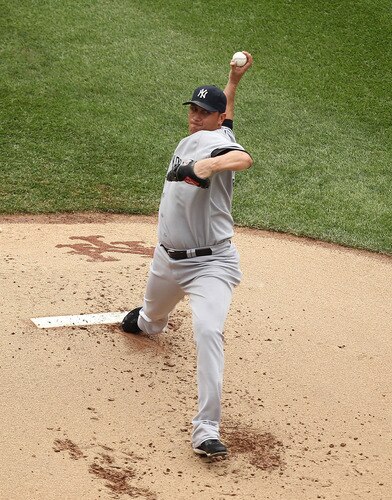 NEW YORK, NY - JULY 03:  Freddy Garcia #36 of the New York Yankees pitches against the New York Mets during their game on July 3, 2011 at Citi Field in the Flushing neighborhood of the Queens borough of New York City.  <br /><br /><span class="help">(Photo by Al Bello/Getty Images)</span>