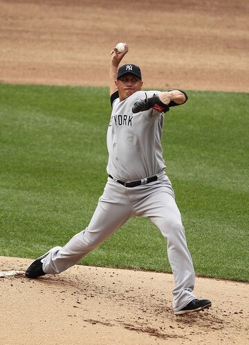 NEW YORK, NY - JULY 03:  Freddy Garcia #36 of the New York Yankees pitches against the New York Mets during their game on July 3, 2011 at Citi Field in the Flushing neighborhood of the Queens borough of New York City.  <br /><br /><span class="help">(Photo by Al Bello/Getty Images)</span>