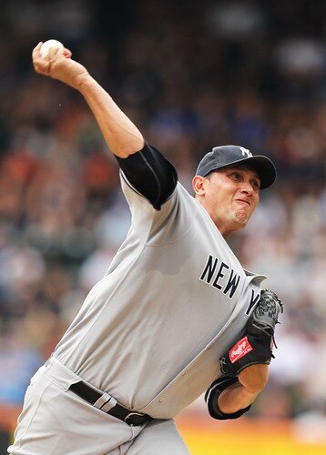 NEW YORK, NY - JULY 03:  Freddy Garcia #36 of the New York Yankees pitches against the New York Mets during their game on July 3, 2011 at Citi Field in the Flushing neighborhood of the Queens borough of New York City.  <br /><br /><span class="help">(Photo by Al Bello/Getty Images)</span>