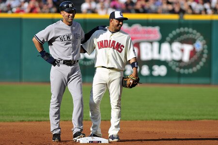 CLEVELAND, OH - JULY 4: Derek Jeter #2 of the New York Yankees talks with Orlando Cabrera (20) of the Cleveland Indians while standing on second base during the first inning at Progressive Field on July 4, 2011 in Cleveland, Ohio. <br /><br /><span class="help">(Photo by Jason Miller/Getty Images)</span>
