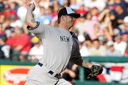 CLEVELAND, OH - JULY 4: Starting pitcher A.J. Burnett #34 of the New York Yankees during the third inning against the Cleveland Indians at Progressive Field on July 4, 2011 in Cleveland, Ohio. <br /><br /><span class="help">(Photo by Jason Miller/Getty Images)</span>