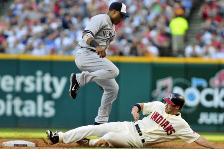 CLEVELAND, OH - JULY 4: Grady Sizemore #24 of the Cleveland Indians is out at second as Robinson Cano #24 of the New York Yankees jumps to avoid the slide during the fifth inning at Progressive Field on July 4, 2011 in Cleveland, Ohio. <br /><br /><span class="help">(Photo by Jason Miller/Getty Images)</span>