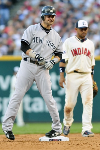 CLEVELAND, OH - JULY 4: Nick Swisher #33 of the New York Yankees on second base after hitting a two run RBI double during the seventh inning against the Cleveland Indians at Progressive Field on July 4, 2011 in Cleveland, Ohio. <br /><br /><span class="help">(Photo by Jason Miller/Getty Images)</span>