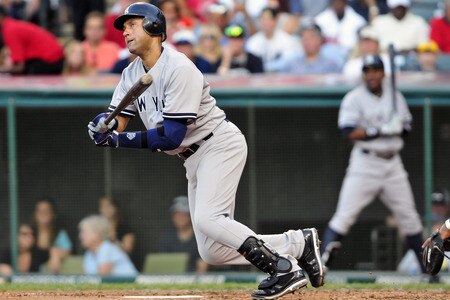 CLEVELAND, OH - JULY 4: Derek Jeter #2 of the New York Yankees hits a ground ball for an out during the sixth inning against the Cleveland Indians at Progressive Field on July 4, 2011 in Cleveland, Ohio. <br /><br /><span class="help">(Photo by Jason Miller/Getty Images)</span>