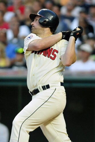 CLEVELAND, OH - JULY 4: Austin Kearns #26 of the Cleveland Indians hits a three run home run during the seventh inning against the New York Yankees at Progressive Field on July 4, 2011 in Cleveland, Ohio. <br /><br /><span class="help">(Photo by Jason Miller/Getty Images)</span>