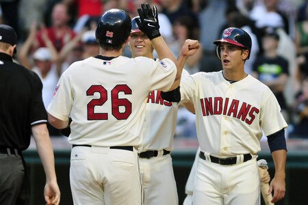 CLEVELAND, OH - JULY 4: Austin Kearns #26 is greeted by Shelley Duncan #47 and Lonnie Chisenhall #27 of the Cleveland Indians after Kearn's three run home run during the seventh inning against the New York Yankees at Progressive Field on July 4, 2011 in Cleveland, Ohio. <br /><br /><span class="help">(Photo by Jason Miller/Getty Images)</span>