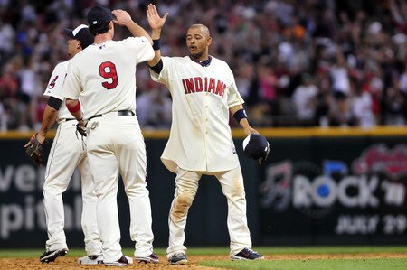 CLEVELAND, OH - JULY 4: Jack Hannahan #9 and Orlando Cabrera 20 of the Cleveland Indians celebrate after defeating the New York Yankees 6-3 at Progressive Field on July 4, 2011 in Cleveland, Ohio. <br /><br /><span class="help">(Photo by Jason Miller/Getty Images)</span>