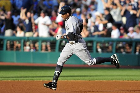 CLEVELAND, OH - JULY 5: Curtis Granderson #14 of the New York Yankees rounds first base after hitting a two-run home run during the second inning against the Cleveland Indians at Progressive Field on July 5, 2011 in Cleveland, Ohio. <br /><br /><span class="help">(Photo by Jason Miller/Getty Images)</span>