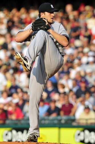 CLEVELAND, OH - JULY 6: Phil Hughes #65 of the New York Yankees pitches during the first inning against the Cleveland Indians at Progressive Field on July 6, 2011 in Cleveland, Ohio. <br /><br /><span class="help">(Photo by Jason Miller/Getty Images)</span>