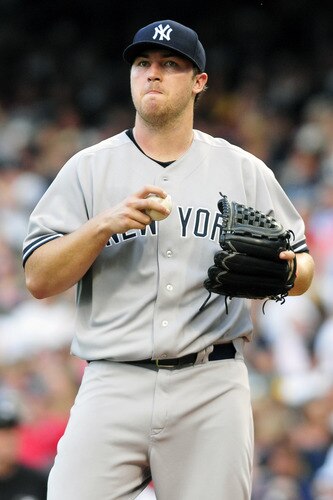CLEVELAND, OH - JULY 6: Starting pitcher Phil Hughes #65 of the New York Yankees reacts during the first inning against the Cleveland Indians at Progressive Field on July 6, 2011 in Cleveland, Ohio. <br /><br /><span class="help">(Photo by Jason Miller/Getty Images)</span>