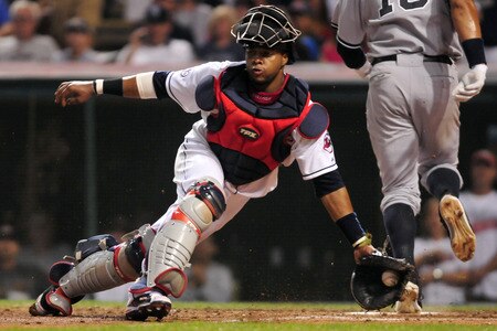 CLEVELAND, OH - JULY 6: Carlos Santana #41 of the Cleveland Indians catches the throw to home as Alex Rodriguez #13 of the New York Yankees scores during the ninth inning at Progressive Field on July 6, 2011 in Cleveland, Ohio. The Indians defeated the Yankees 5-3 to take the series 2-1. <br /><br /><span class="help">(Photo by Jason Miller/Getty Images)</span>