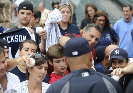 CHICAGO, IL - AUGUST 01: Baseball Hall of Famer Reggie Jackson signs autographs before the Chicago White Sox and New York Yankees game on August 1, 2011 at U.S. Cellular Field in Chicago, Illinois.  <br /><br /><span class="help">(Photo by David Banks/Getty Images)</span>