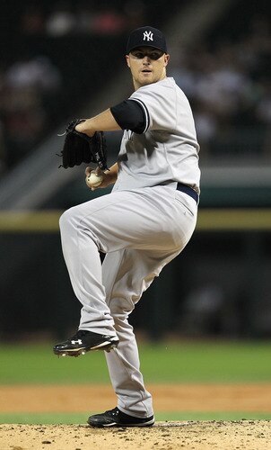 CHICAGO, IL - AUGUST 02: Starting pitcher Phil Hughes #65 of the New York Yankees delivers the ball against the Chicago White Sox at U.S. Cellular Field on August 2, 2011 in Chicago, Illinois. <br /><br /><span class="help">(Photo by Jonathan Daniel/Getty Images)</span>
