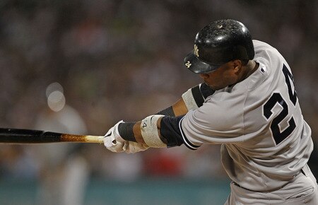 CHICAGO, IL - AUGUST 02: Robinson Cano #24 of the New York Yankees hits a run-scoring double in the 1st inning against the Chicago White Sox at U.S. Cellular Field on August 2, 2011 in Chicago, Illinois. <br /><br /><span class="help">(Photo by Jonathan Daniel/Getty Images)</span>