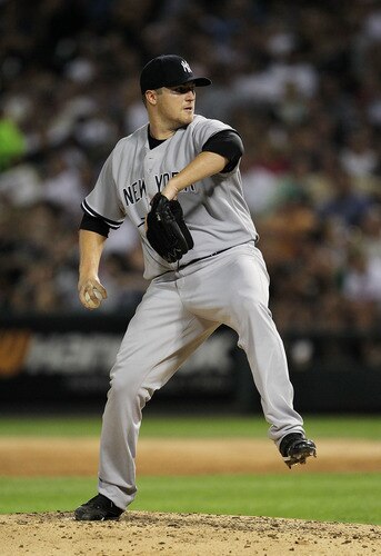 CHICAGO, IL - AUGUST 02:  Starting pitcher Phil Hughes #65 of the New York Yankees delivers the ball against the Chicago White Sox at U.S. Cellular Field on August 2, 2011 in Chicago, Illinois.  <br /><br /><span class="help">(Photo by Jonathan Daniel/Getty Images)</span>