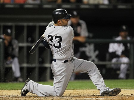 CHICAGO, IL - AUGUST 02: Nick Swisher #33 of the New York Yankees lands on his knee after fouling off a pitch against the Chicago White Sox at U.S. Cellular Field on August 2, 2011 in Chicago, Illinois. <br /><br /><span class="help">(Photo by Jonathan Daniel/Getty Images)</span>
