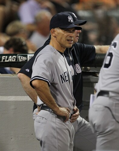 CHICAGO, IL - AUGUST 02: Manager Joe Girardi #28 of the New York Yankees watches as his team takes on the Chicago White Sox at U.S. Cellular Field on August 2, 2011 in Chicago, Illinois. <br /><br /><span class="help">(Photo by Jonathan Daniel/Getty Images)</span>