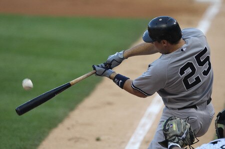 CHICAGO, IL - AUGUST 03: Mark Teixiera #25 of the New York Yankees drives in a run with a fly ball in the 1st inning against the Chicago White Sox at U.S. Cellular Field on August 3, 2011 in Chicago, Illinois. <br /><br /><span class="help">(Photo by Jonathan Daniel/Getty Images)</span>