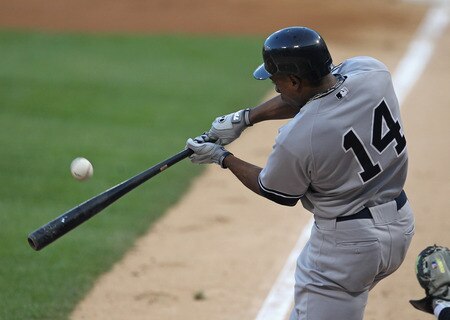 CHICAGO, IL - AUGUST 03: Curtis Granderson #14 of the New York Yankees gets a hit in the 1st inning against the Chicago White Sox at U.S. Cellular Field on August 3, 2011 in Chicago, Illinois. <br /><br /><span class="help">(Photo by Jonathan Daniel/Getty Images)</span>